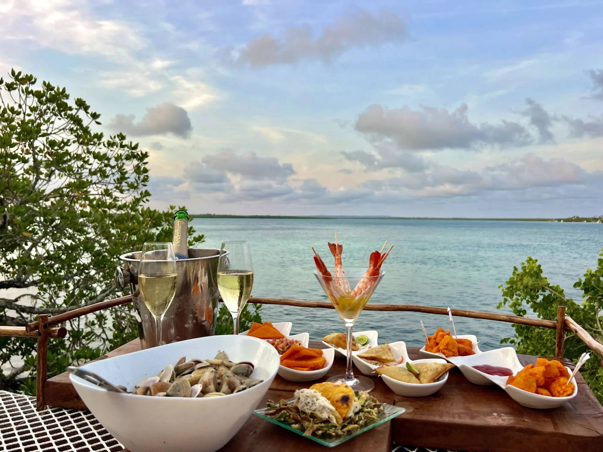 The Imperial Banda suite with its wide wooden terrace looking out over Mida Creek and the ocean